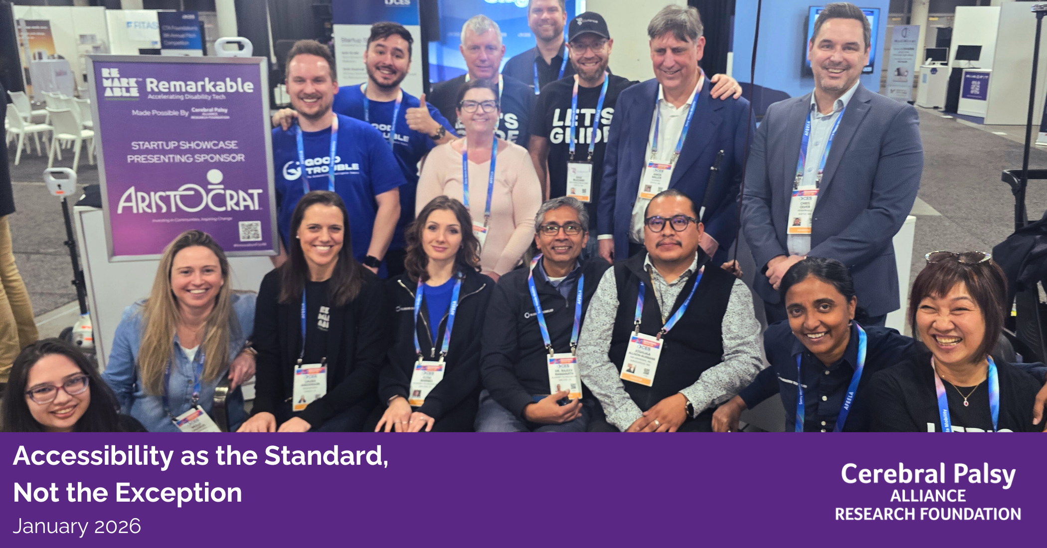 A large group of smiling conference attendees pose together at CES on the Startup Stage, many wearing badges and shirts that reference disability innovation. A purple text overlay reads, “Accessibility as the Standard, Not the Exception — January 2026,” alongside the Cerebral Palsy Alliance Research Foundation logo.
